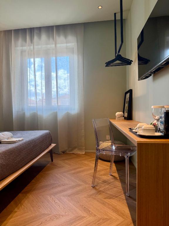 Postel nebo postele na pokoji v ubytování Four Rooms Catania