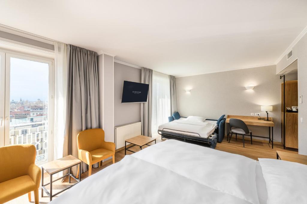 Postel nebo postele na pokoji v ubytování Eurostars uHOTEL