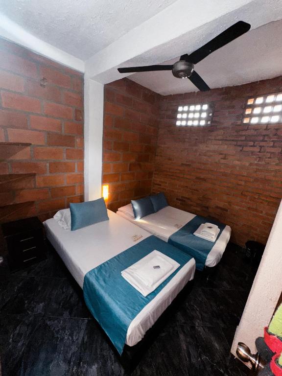 Postel nebo postele na pokoji v ubytování Hotel Mawill