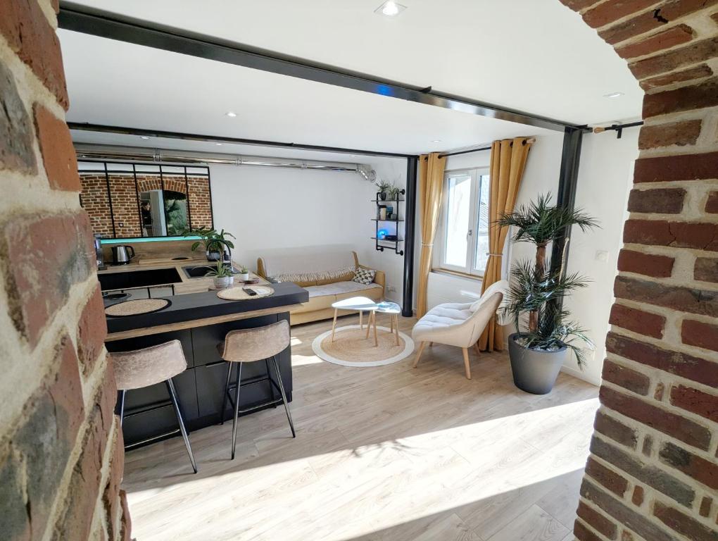 Posezení v ubytování Gîte Oasis Ault - Ciné, Balnéo & Confort à la Mer