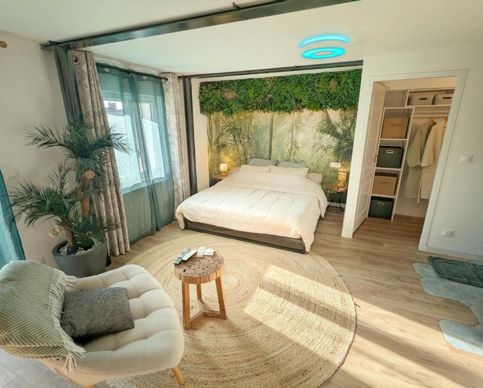 Postel nebo postele na pokoji v ubytování Gîte Oasis Ault - Ciné, Balnéo & Confort à la Mer
