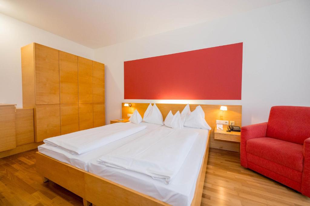 Ein Bett oder Betten in einem Zimmer der Unterkunft Allegria Resort Stegersbach - Allegria Hotel
