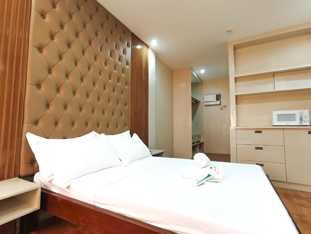 Postel nebo postele na pokoji v ubytování Dreaming Forest Hotel - Libjo, Batangas