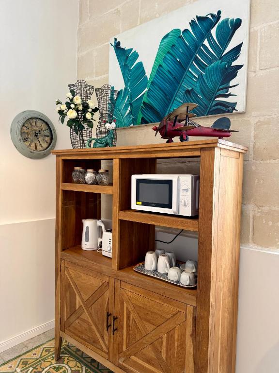 Kuchyň nebo kuchyňský kout v ubytování Central Boutique Apartment Near Valletta - Perfect for Couples Wanting to Discover Malta