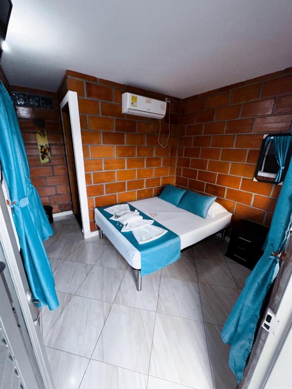Postel nebo postele na pokoji v ubytování Hotel Mawill