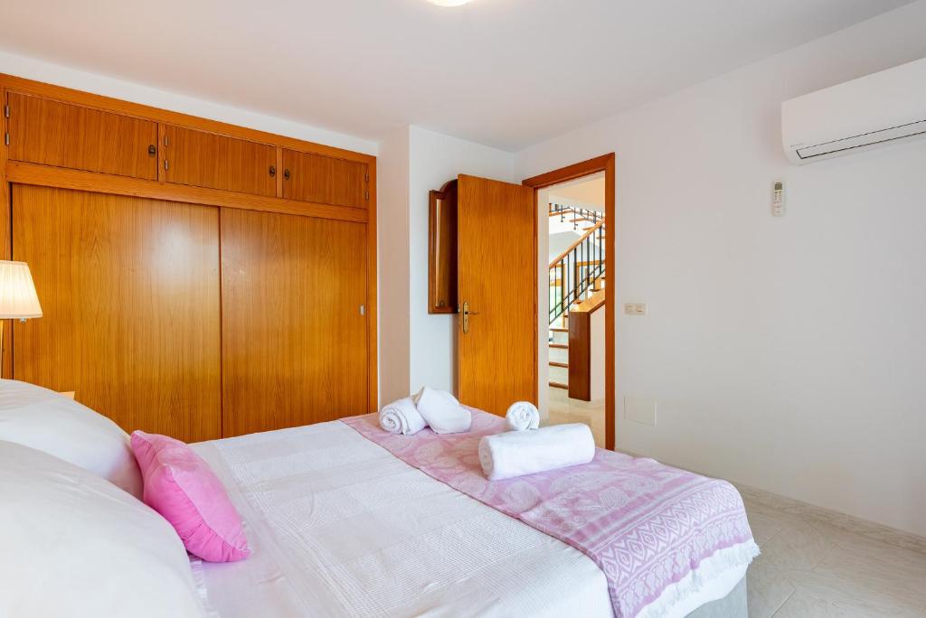 Postel nebo postele na pokoji v ubytování Villa Garrido