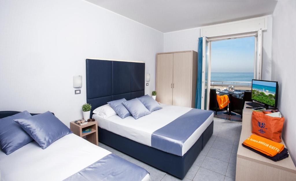 Postel nebo postele na pokoji v ubytování Baby Family Hotel Alda Amelia