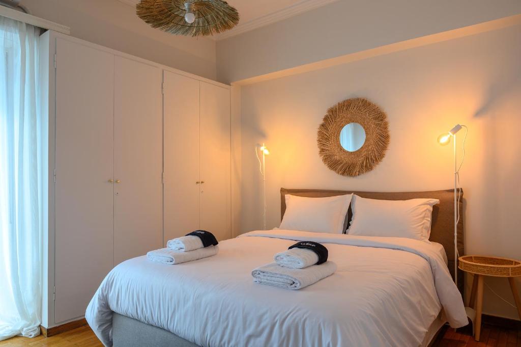 Ένα ή περισσότερα κρεβάτια σε δωμάτιο στο EfZin cozy house, Patras center