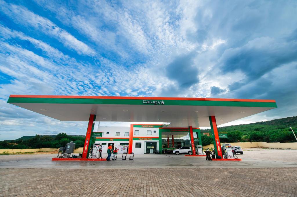 a gas station with a gas station at Pousada Calugy in Jardim