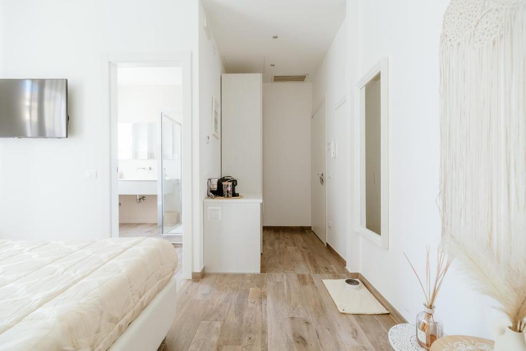 Telewizja i/lub zestaw kina domowego w obiekcie Home Alba Rooms