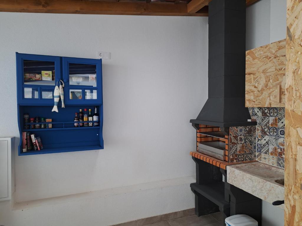A cozinha ou cozinha compacta de Pátio C'un Casinhas