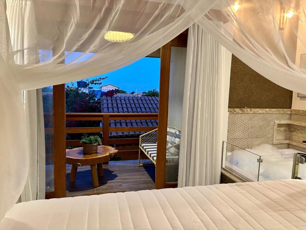 En eller flere senge i et værelse på Casa Estrela Luz - Xandó - Caraiva