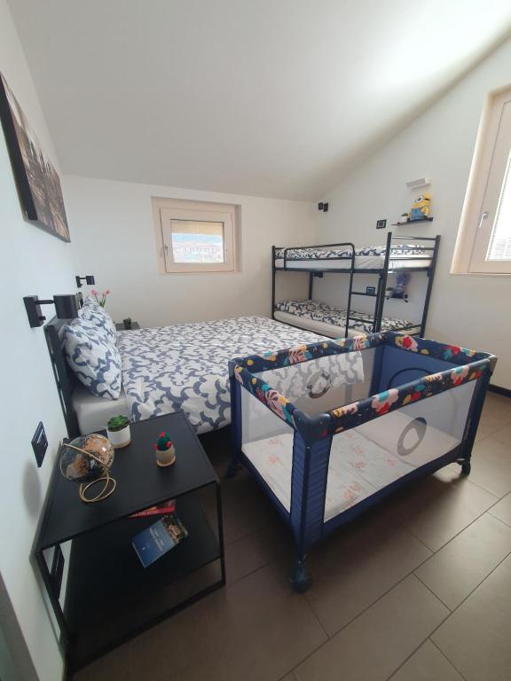 Postel nebo postele na pokoji v ubytování B&B Casa Sara