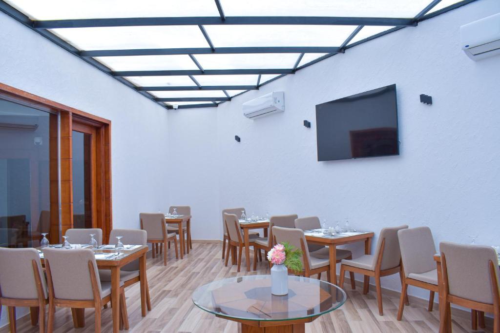 TV a/nebo společenská místnost v ubytování Basma Executive Club