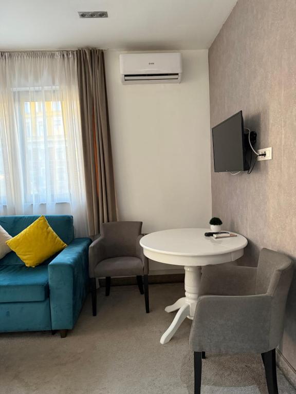 Posezení v ubytování Deluxe Nortel Hotel