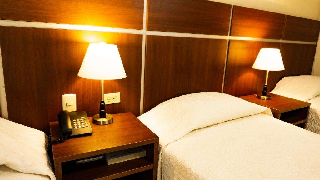 Postel nebo postele na pokoji v ubytování Hotel Benidorm Panama