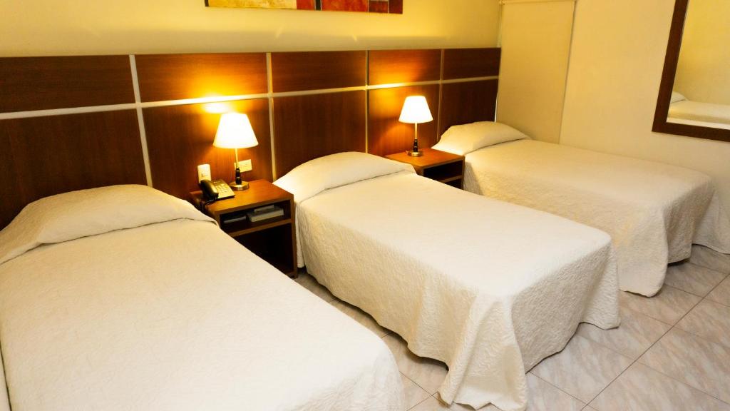 Postel nebo postele na pokoji v ubytování Hotel Benidorm Panama