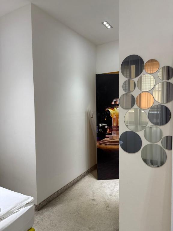 Postel nebo postele na pokoji v ubytování Deluxe Nortel Hotel