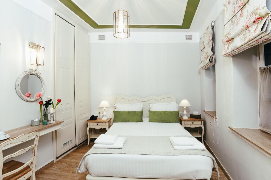 Letto o letti in una camera di Hotel Kastro