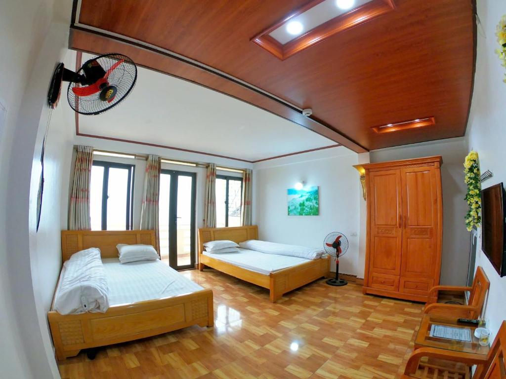 Postel nebo postele na pokoji v ubytování Minh Hưng Hostel