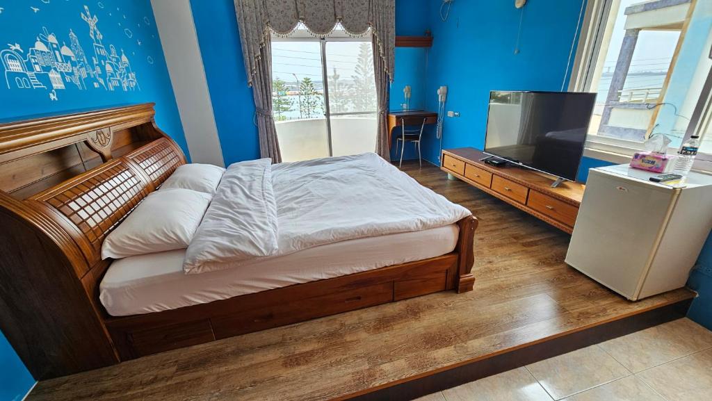 Postel nebo postele na pokoji v ubytování Sea Front Homestay