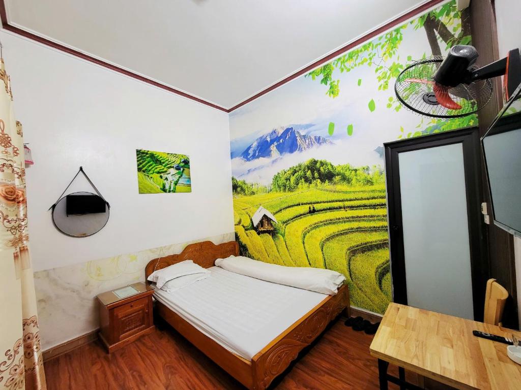 Postel nebo postele na pokoji v ubytování Minh Hưng Hostel