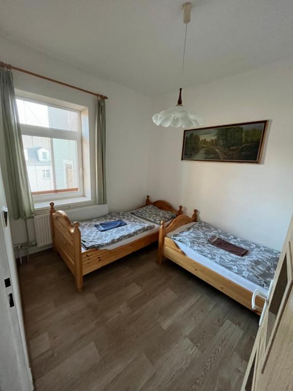 Postel nebo postele na pokoji v ubytování Penzion Fajn Klub