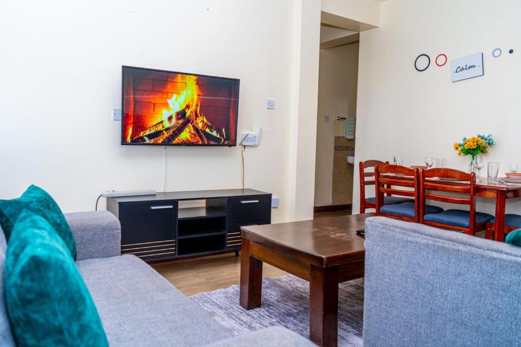 TV a/nebo společenská místnost v ubytování Itakaat