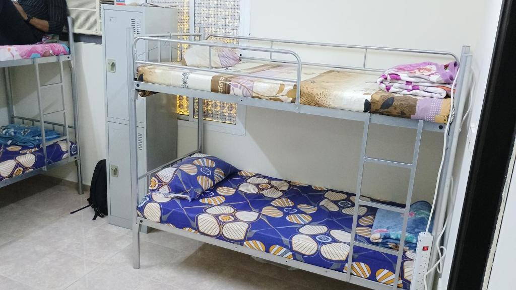 Palanda nebo palandy na pokoji v ubytování Cozy Vibes Hostel
