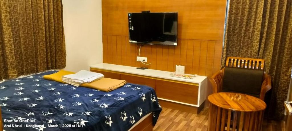 Postel nebo postele na pokoji v ubytování Raja Hill Resorts