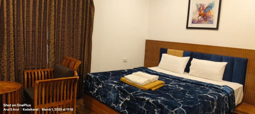 Postel nebo postele na pokoji v ubytování Raja Hill Resorts