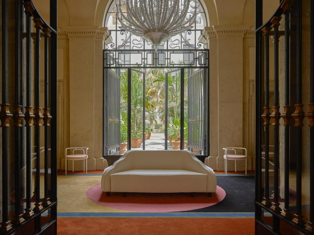 Postel nebo postele na pokoji v ubytování Palazzo Talìa - Small Luxury Hotels of the World