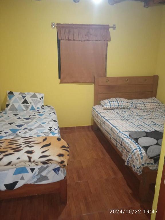 Postel nebo postele na pokoji v ubytování Casa Miscuya