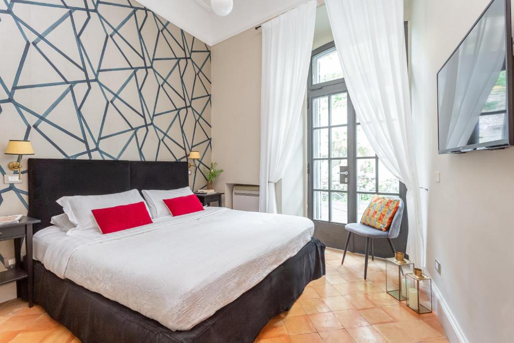 Postel nebo postele na pokoji v ubytování Hotel Parrasio