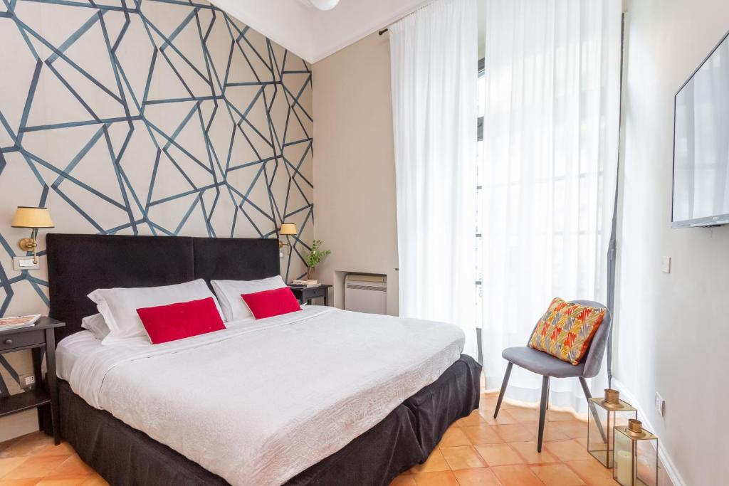 Postel nebo postele na pokoji v ubytování Hotel Parrasio