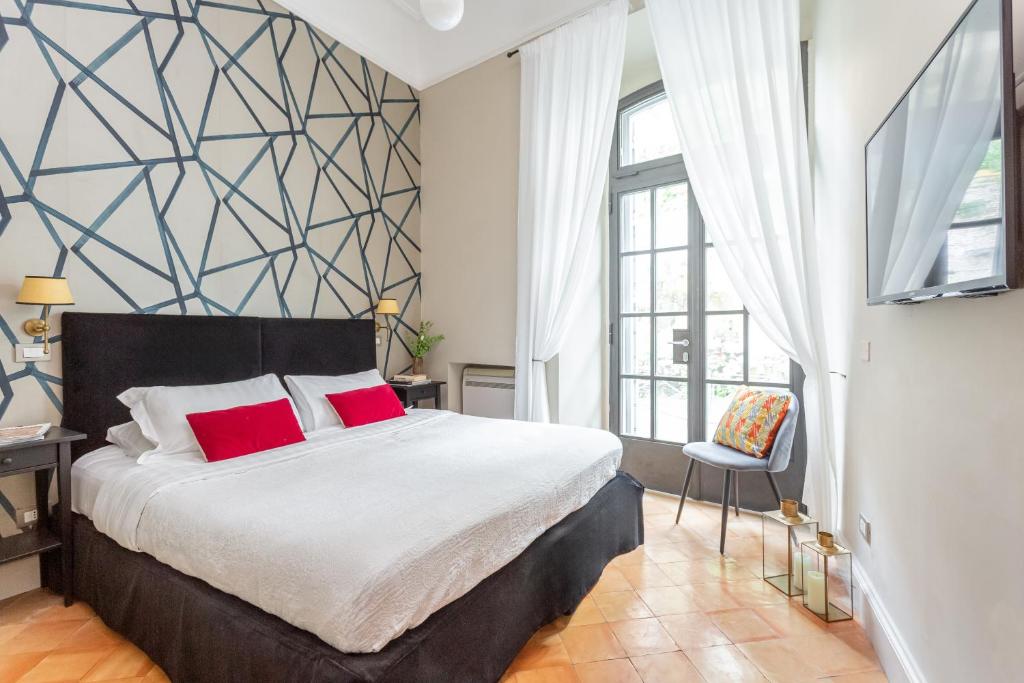 Postel nebo postele na pokoji v ubytování Hotel Parrasio