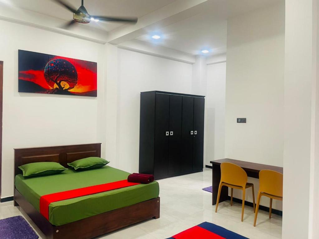 Postel nebo postele na pokoji v ubytování Hotel Ceylonia Colombo