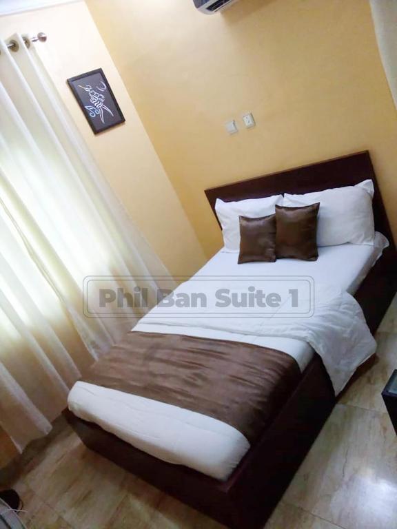 Postel nebo postele na pokoji v ubytování Ban Guest House