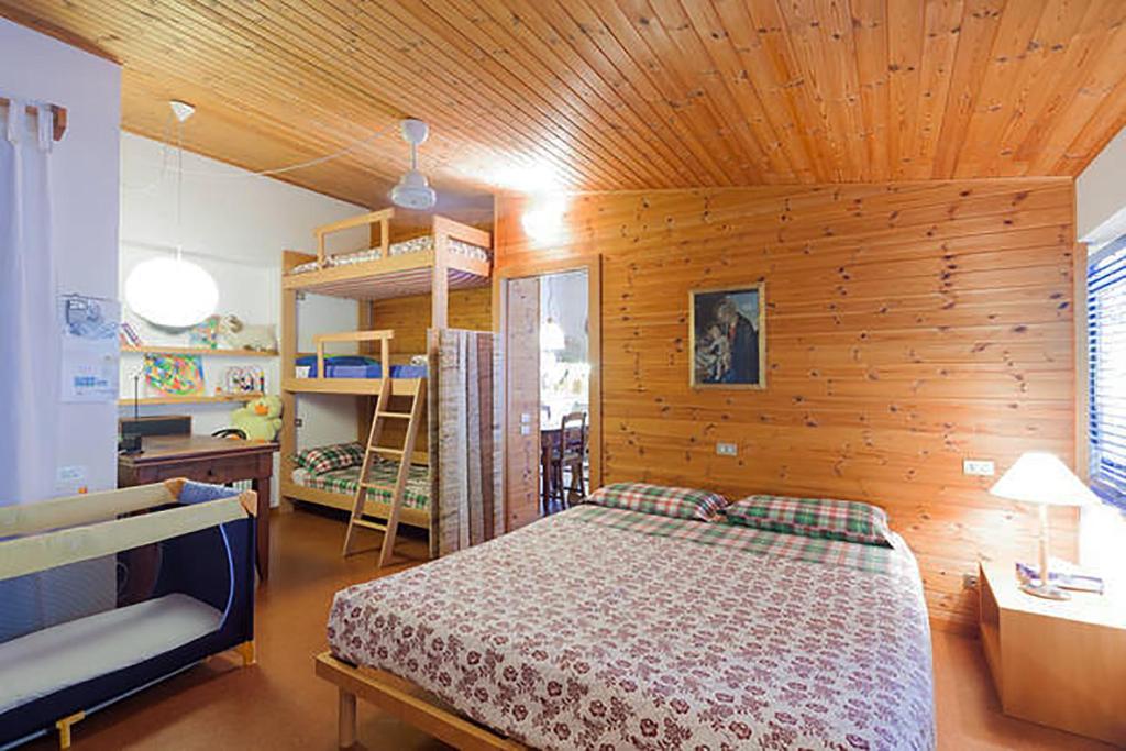 Postel nebo postele na pokoji v ubytování La Casa Trasparente - locazioni brevi