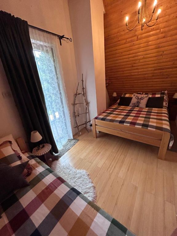 Posteľ alebo postele v izbe v ubytovaní Chalet Calla