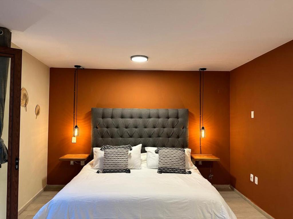 Postel nebo postele na pokoji v ubytování Casa Bakora Hotel