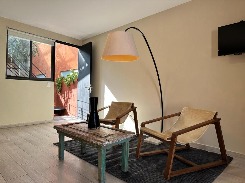 TV a/nebo společenská místnost v ubytování Casa Bakora Hotel