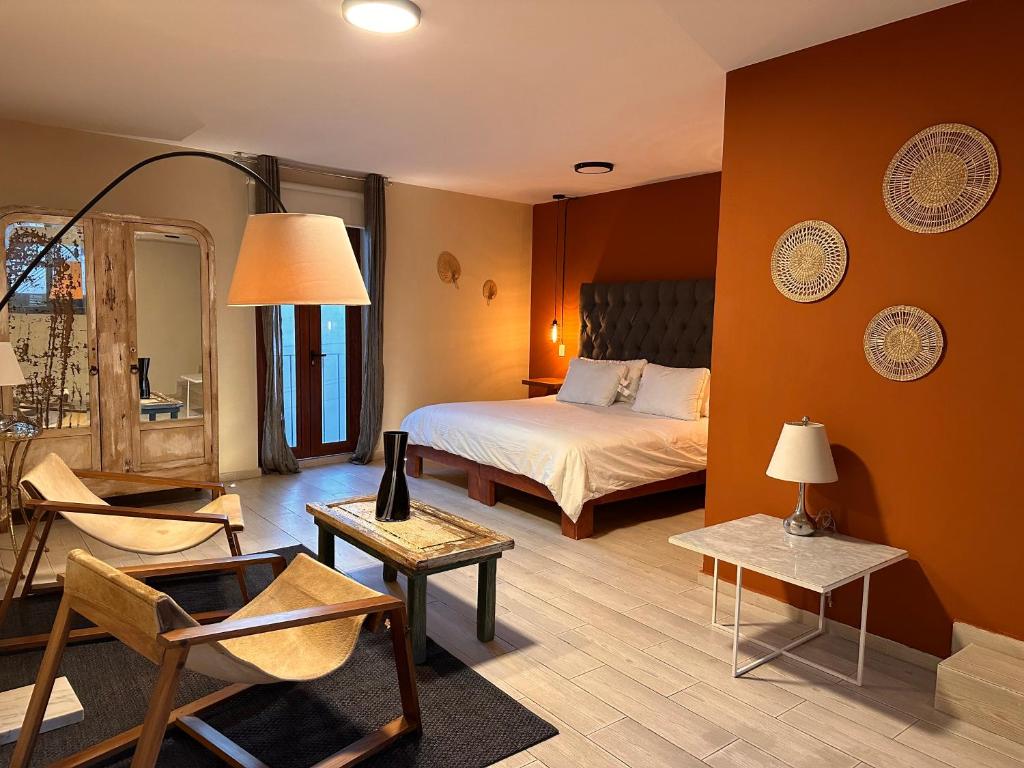 Postel nebo postele na pokoji v ubytování Casa Bakora Hotel