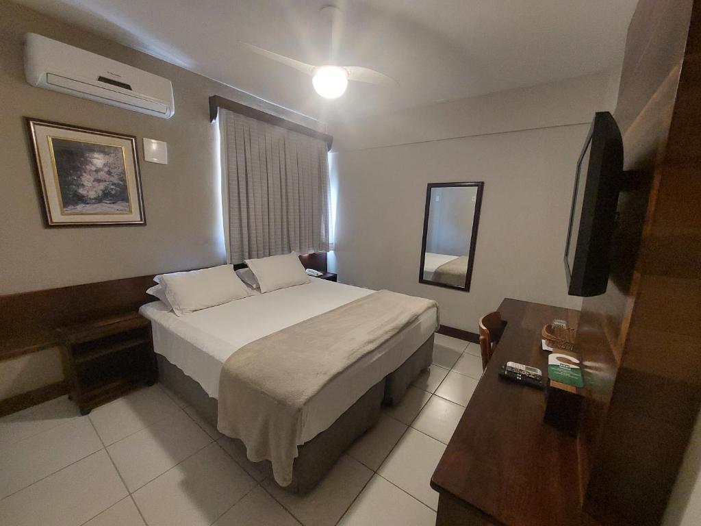 Postel nebo postele na pokoji v ubytování Príncipe Hotel