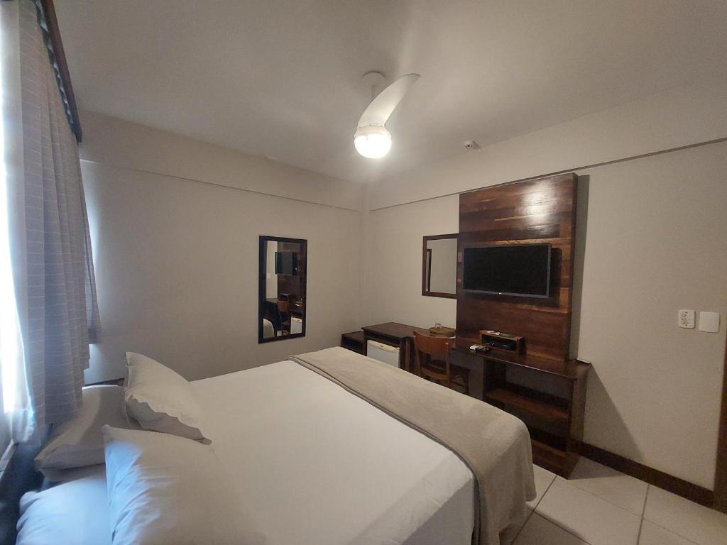 Postel nebo postele na pokoji v ubytování Príncipe Hotel