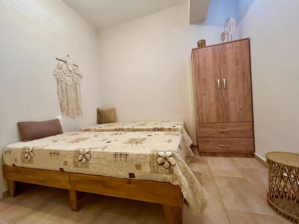 Postel nebo postele na pokoji v ubytování SK studios & apartments