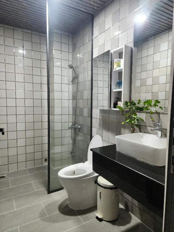 Koupelna v ubytování Hotel & Homestay LABUBU