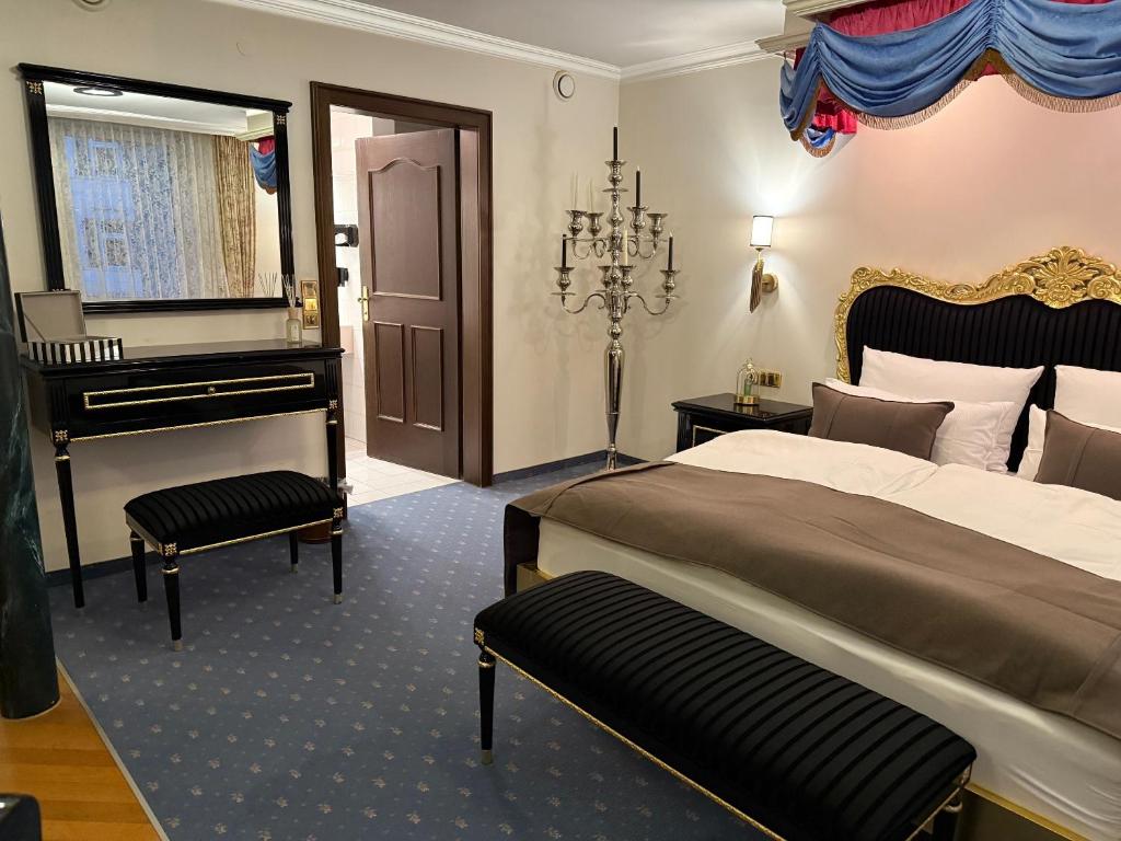 Postel nebo postele na pokoji v ubytování Hotel Kaiser