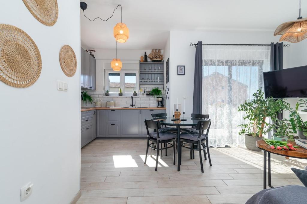 Kuchyňa alebo kuchynka v ubytovaní Apartman Špiro