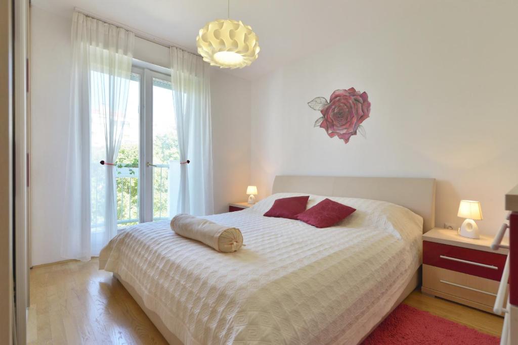 Posteľ alebo postele v izbe v ubytovaní Cozy beach apartment Split